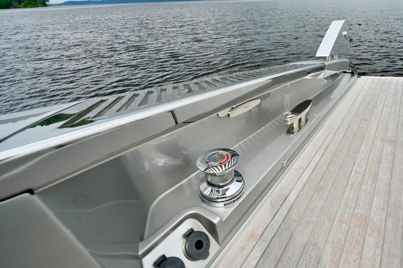 Maximus Yacht Photos Pics 2023 Riva 56 Rivale yacht deck detail with winch and water view.