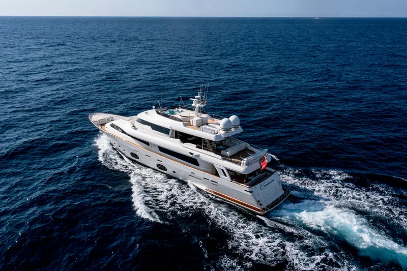 Centurion Yacht Photos Pics Luxurious 2013 Custom Line Navetta 33 Crescendo yacht cruising on open sea.