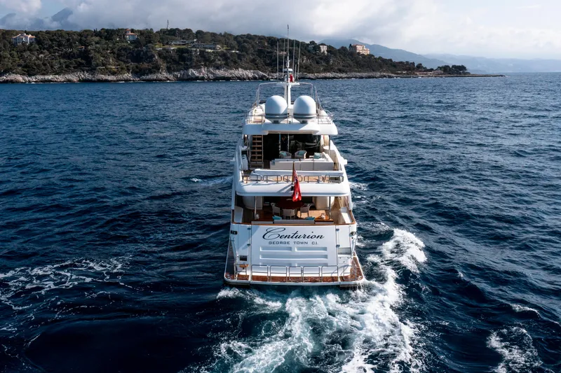Centurion Yacht Photos Pics Luxurious 2013 Custom Line Navetta 33 Crescendo yacht cruising on open sea.