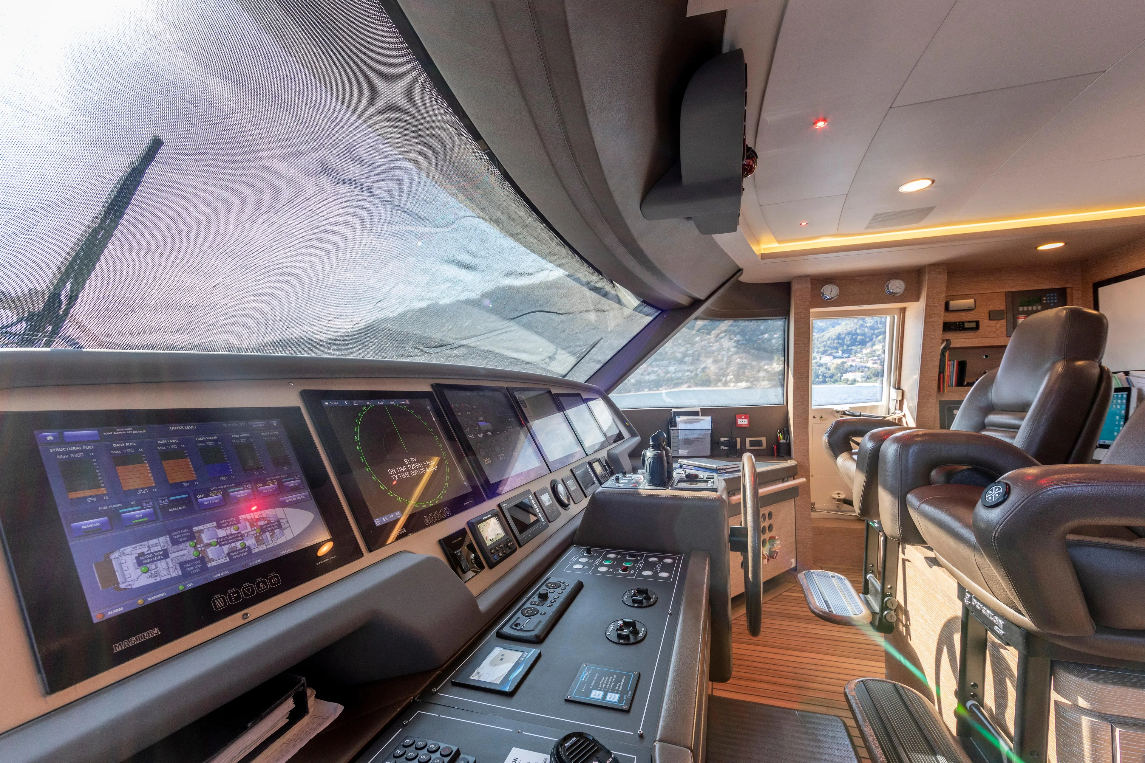 Centurion Yacht Photos Pics Luxurious 2013 Custom Line Navetta 33 Crescendo yacht cockpit with advanced navigation systems.