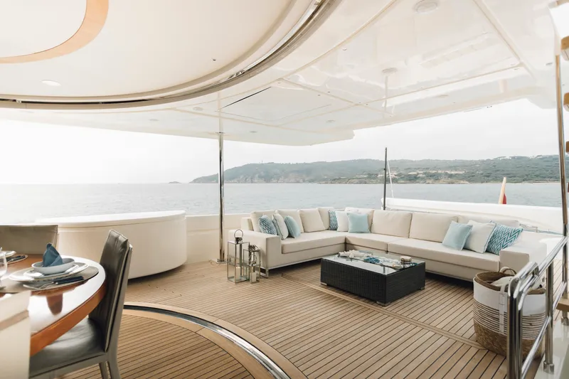 Centurion Yacht Photos Pics Luxurious 2013 Custom Line Navetta 33 Crescendo yacht interior with ocean view and elegant seating.