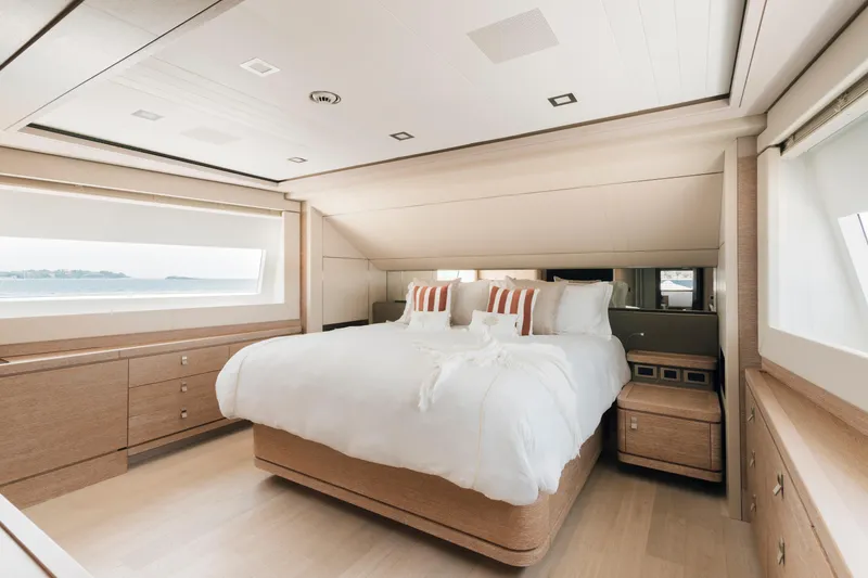 Centurion Yacht Photos Pics Luxurious bedroom interior on 2013 Custom Line Navetta 33 Crescendo yacht, featuring elegant design.