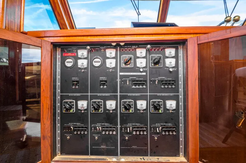  Yacht Photos Pics Control panel of a 1981 Hatteras Extended Deckhouse yacht, featuring gauges and switches.