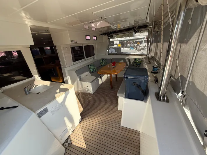 Carolina Breeze Yacht Photos Pics Spacious interior of 2009 Lagoon 500 catamaran with seating and table.