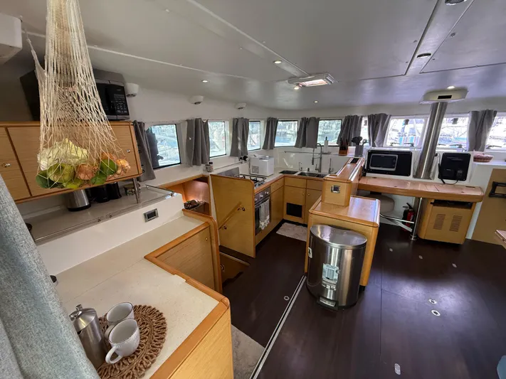 Carolina Breeze Yacht Photos Pics Spacious interior of 2009 Lagoon 500 catamaran with modern kitchen and ample natural light.