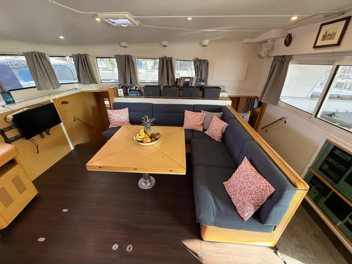 Carolina Breeze Yacht Photos Pics Spacious interior of 2009 Lagoon 500 catamaran with cozy seating and dining area.