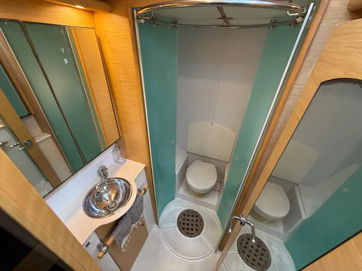 Carolina Breeze Yacht Photos Pics 2009 Lagoon 500 yacht bathroom with shower, sink, and toilet.