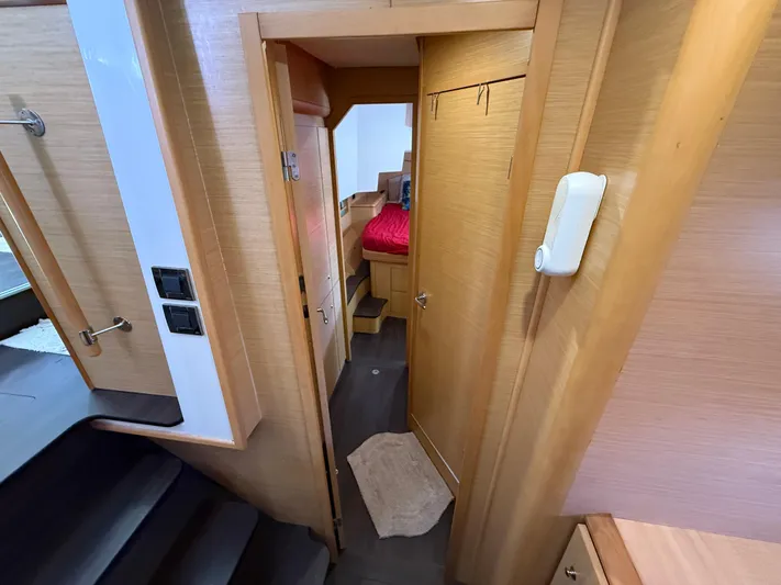 Carolina Breeze Yacht Photos Pics Interior of 2009 Lagoon 500 yacht, featuring wooden paneling and cozy cabin space.