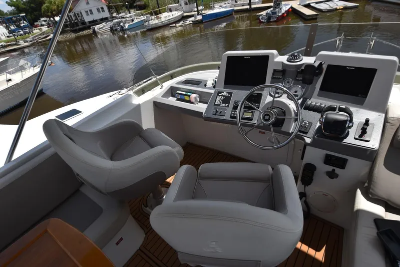  Yacht Photos Pics Helm of 2019 Beneteau Swift Trawler 44 with dual screens and steering wheel.