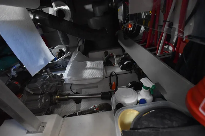  Yacht Photos Pics Engine room of 2019 Beneteau Swift Trawler 44 with maintenance supplies and equipment.