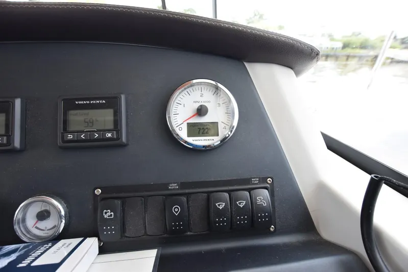  Yacht Photos Pics Control panel of 2019 Beneteau Swift Trawler 44 with Volvo Penta gauges and switches.