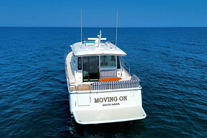 Moving On Yacht Photos Pics 2022 Sabre 48 Salon Express yacht named "Moving On" on open sea.