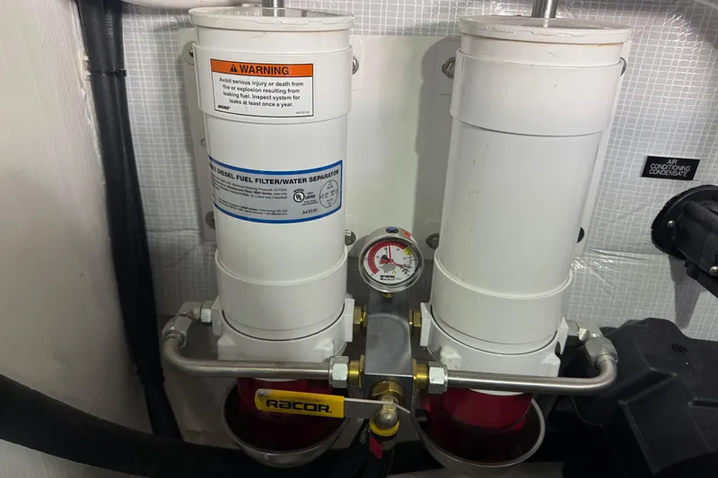 Moving On Yacht Photos Pics Diesel fuel filter system in 2022 Sabre 48 Salon Express yacht engine room.