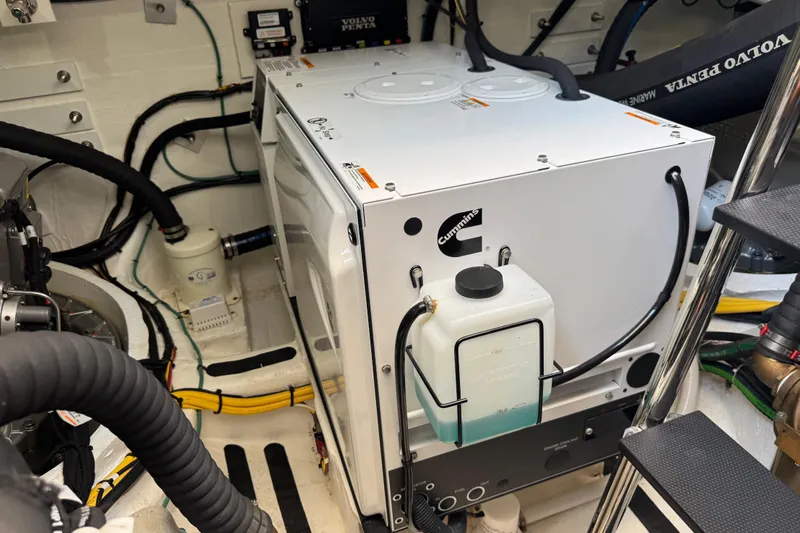 Moving On Yacht Photos Pics Engine room of 2022 Sabre 48 Salon Express with Cummins generator and Volvo Penta components.