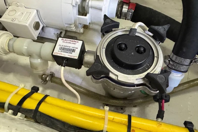 Moving On Yacht Photos Pics Engine compartment of 2022 Sabre 48 Salon Express with ElectroSea ClearLine system.