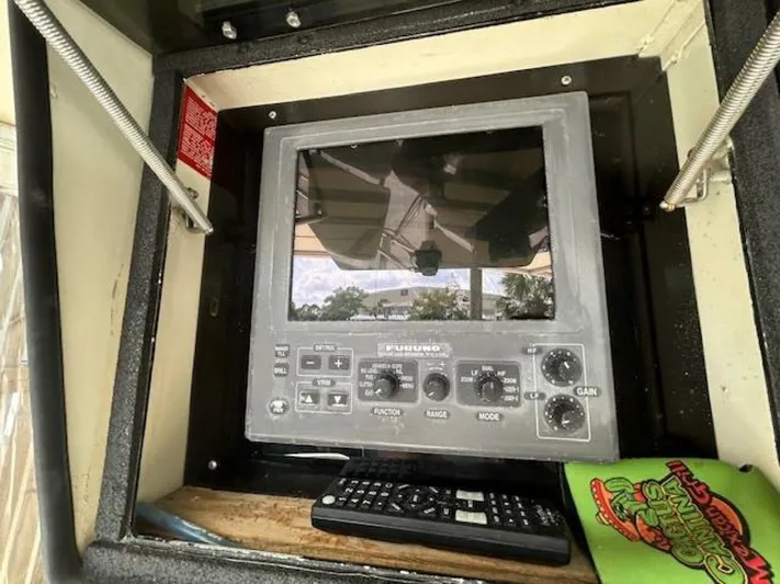 Code Vessel Yacht Photos Pics 1989 Hatteras Convertible boat control panel with Furuno display and remote.