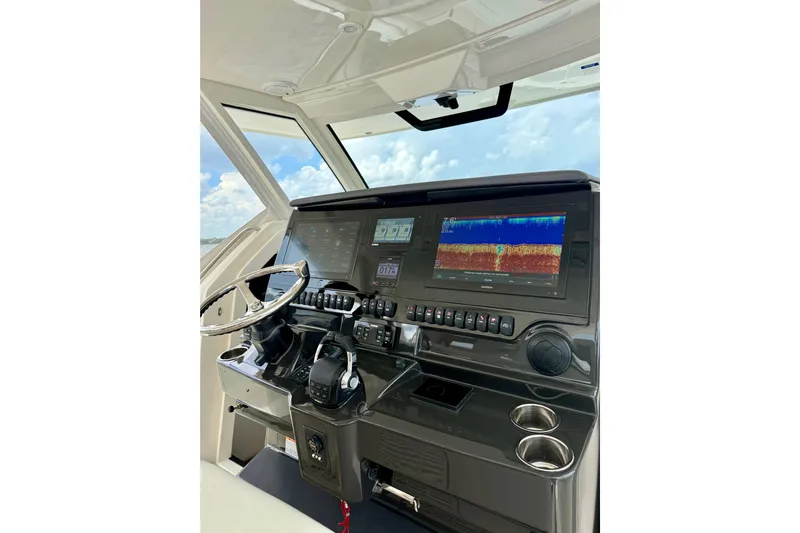 Seakeeper Yacht Photos Pics Helm of 2020 Pursuit S 408 Sport boat with advanced navigation displays.