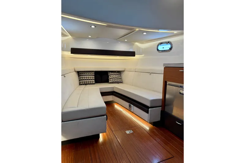 Seakeeper Yacht Photos Pics Luxurious interior of 2020 Pursuit S 408 Sport boat with elegant seating and modern design.
