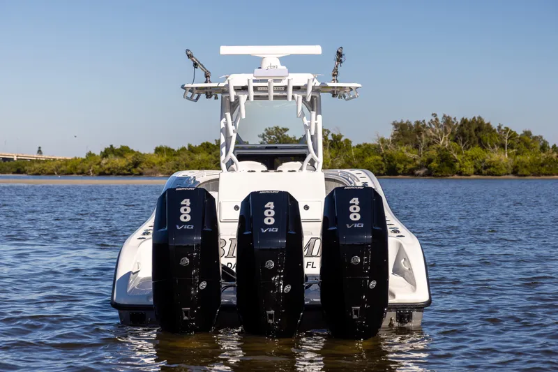 Bid Time 2 Yacht Photos Pics 2023 Yellowfin 36 Offshore boat with triple Mercury 400 V10 engines on water.