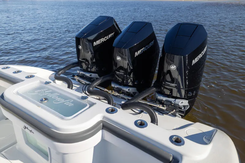Bid Time 2 Yacht Photos Pics 2023 Yellowfin 36 Offshore boat with triple Mercury Verado engines on water.