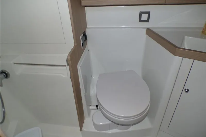 Skyfall Yacht Photos Pics 2025 Beneteau Oceanis 46.1 yacht bathroom with modern toilet and sleek design.