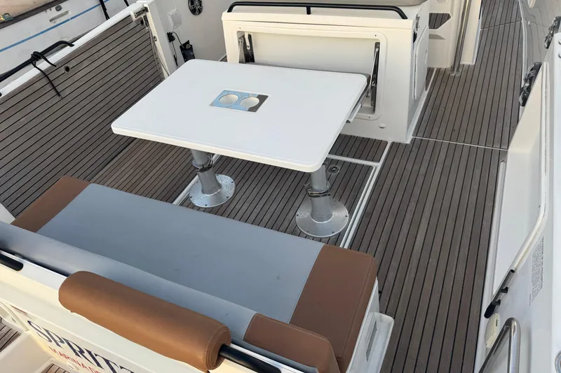 Spritz Yacht Photos Pics 2022 Beneteau Flyer 9 SPACEdeck interior with seating and table on deck.