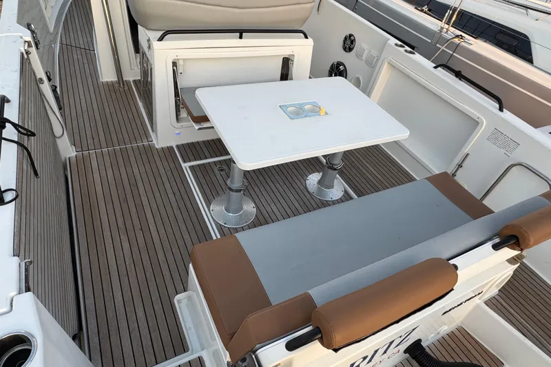 Spritz Yacht Photos Pics 2022 Beneteau Flyer 9 SPACEdeck interior with seating and table on deck.