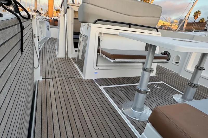Spritz Yacht Photos Pics 2022 Beneteau Flyer 9 SPACEdeck interior with sleek seating and modern design.