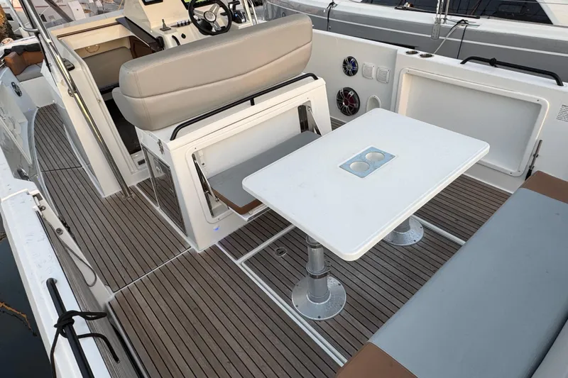 Spritz Yacht Photos Pics 2022 Beneteau Flyer 9 SPACEdeck interior with seating and table on deck.