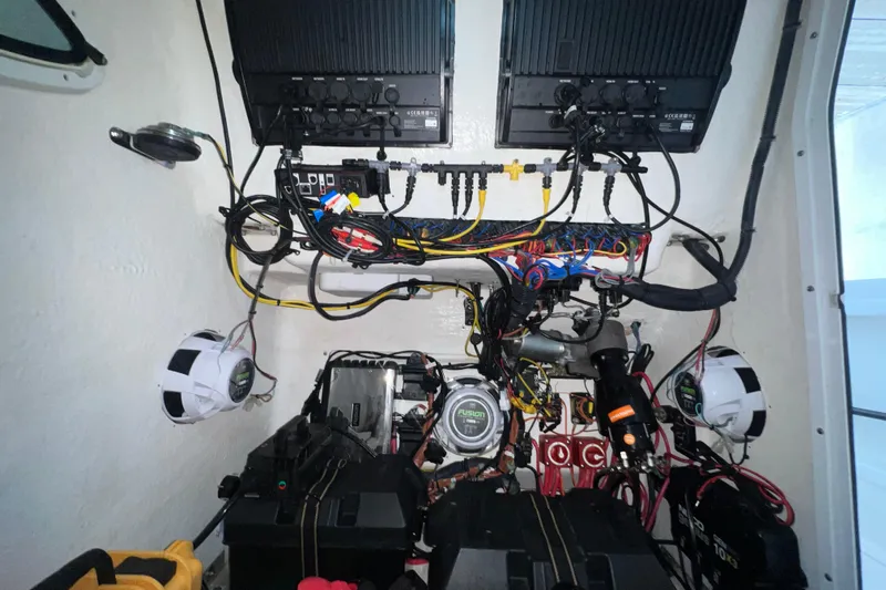  Yacht Photos Pics Electrical system setup in 2022 Twin Vee 280 GFX CC boat, featuring wiring and components.