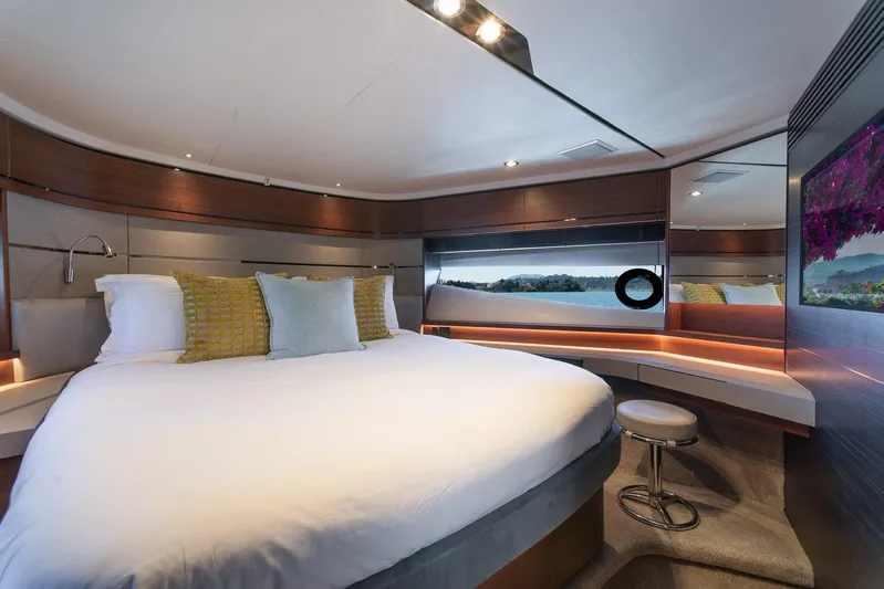 M/y Far Away Yacht Photos Pics Luxurious 2019 Princess S65 yacht bedroom with modern design and scenic window view.