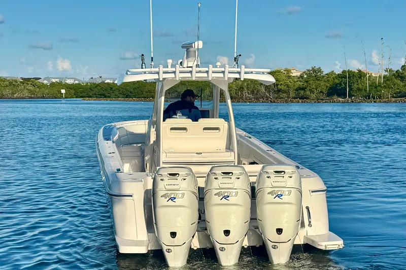  Yacht Photos Pics 2020 Intrepid 375 Nomad SE boat with triple 400R engines on calm water.