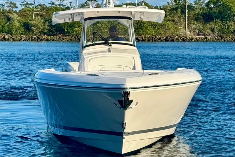  Yacht Photos Pics 2020 Intrepid 375 Nomad SE boat on calm water, front view.