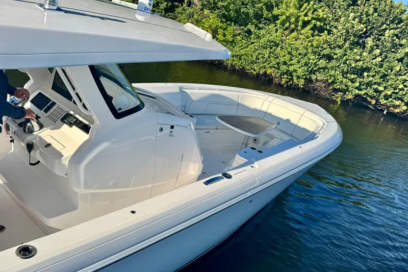 Yacht Photos Pics 2020 Intrepid 375 Nomad SE boat on water, featuring sleek design and modern controls.
