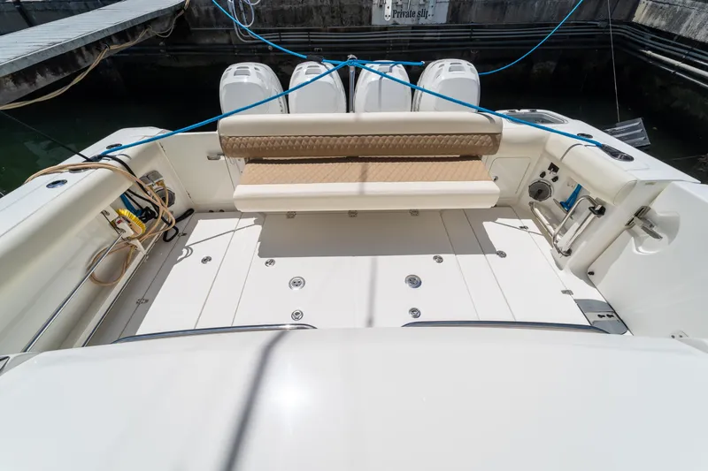  Yacht Photos Pics 2017 Boston Whaler 420 Outrage boat deck with seating and outboard motors.