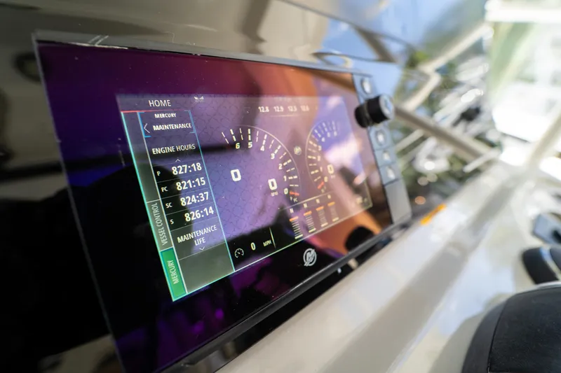  Yacht Photos Pics Dashboard of 2017 Boston Whaler 420 Outrage boat showing engine hours and maintenance data.