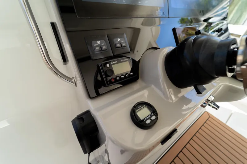  Yacht Photos Pics Control panel of a 2017 Boston Whaler 420 Outrage boat, featuring modern navigation equipment.