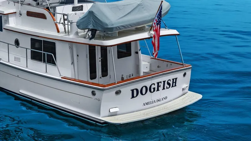 Dogfish Yacht Photos Pics 2023 Krogen Express 52 yacht "Dogfish" on blue water, Amelia Island.