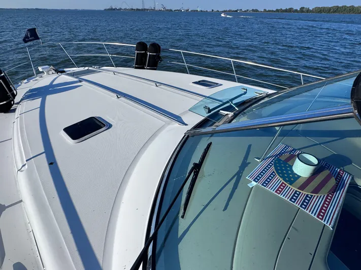  Yacht Photos Pics Sea Ray 380 Sundancer 2001 on calm waters.