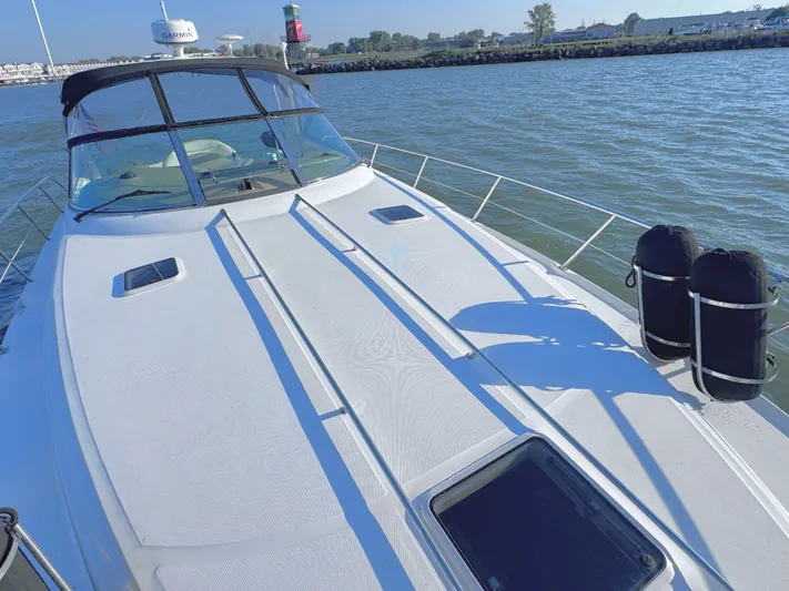  Yacht Photos Pics 2001 Sea Ray 380 Sundancer on calm waters.