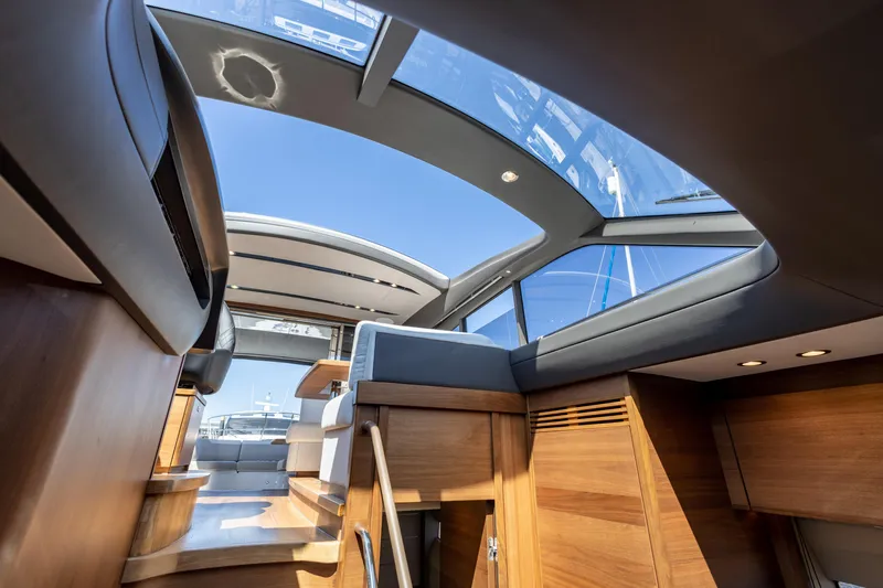  Yacht Photos Pics Interior view of 2021 Princess V50 yacht with modern design and skylight.