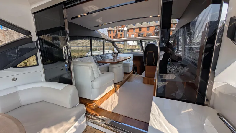  Yacht Photos Pics Luxurious interior of a 2021 Princess V50 yacht with elegant seating and modern design.