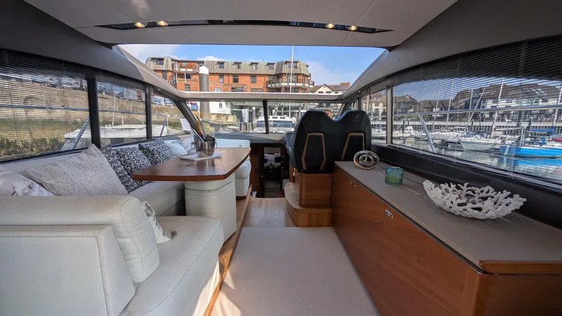  Yacht Photos Pics Luxurious interior of a 2021 Princess V50 yacht with elegant seating and decor.