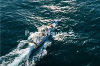 Aerial view of 2020 Capelli Tempest 40 boat cruising on open water.