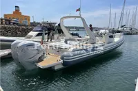 2020 Capelli Tempest 40 boat docked in marina, featuring sleek design and powerful engines.
