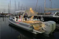 2020 Capelli Tempest 40 boat docked at marina during evening with Yamaha engines.