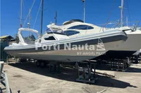 2020 Capelli Tempest 40 boat displayed on a trailer in a marina setting.