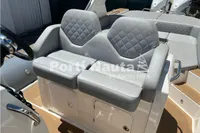 Luxury seating on 2020 Capelli Tempest 40 boat with quilted gray upholstery.