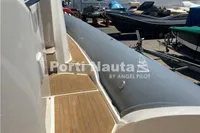 Capelli Tempest 40 boat, 2020 model, docked with wooden deck and inflatable side.