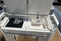 Capelli Tempest 40 (2020) boat kitchenette with stove and sink, featuring Porti Nauta branding.